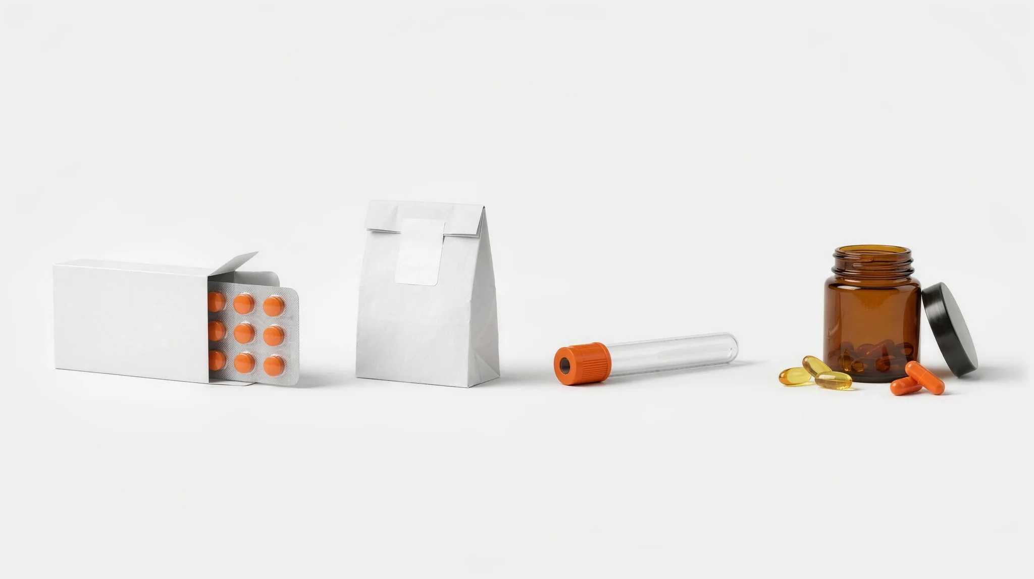 A row of four things: a white medicine box with a blister of orange tablets, a white pharmacy bag with a blank sticker, a blood test tube with an orange cap, and an amber supplement jar with softgels and orange capsules.